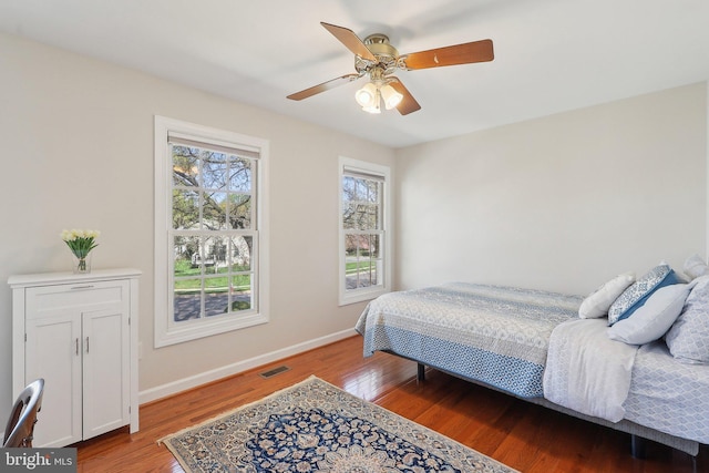 8519 Century Oak Ct, Fairfax Station, VA 22039 - bedroom with light wood-type flooring, ceiling fan, baseboards, and visible vents