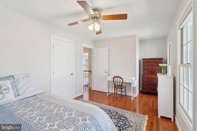 8519 Century Oak Ct, Fairfax Station, VA 22039 - bedroom featuring baseboards, a ceiling fan, and wood finished floors