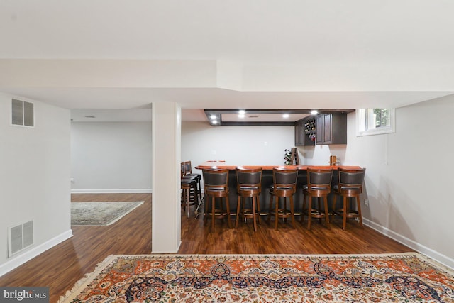 8519 Century Oak Ct, Fairfax Station, VA 22039 - bar featuring bar, visible vents, baseboards, and wood finished floors