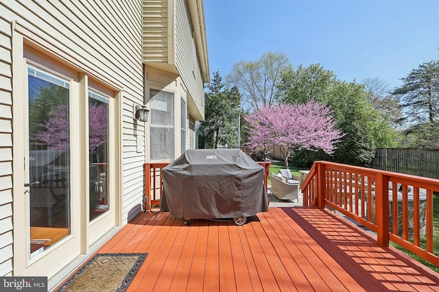 8519 Century Oak Ct, Fairfax Station, VA 22039 - wooden terrace with grilling area and fence private yard