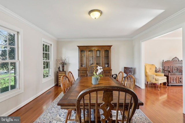 8519 Century Oak Ct, Fairfax Station, VA 22039 - dining room featuring wood finished floors, baseboards, and ornamental molding