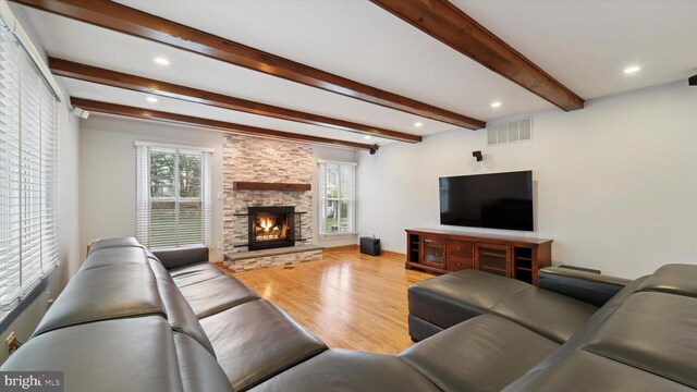 115 Union Mill Ter, Mount Laurel, NJ 08054 - living room with a stone fireplace, recessed lighting, visible vents, beamed ceiling, and wood finished floors