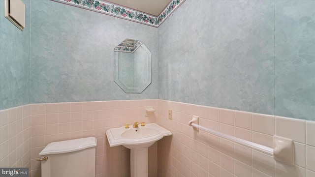 115 Union Mill Ter, Mount Laurel, NJ 08054 - bathroom featuring toilet, wallpapered walls, wainscoting, and tile walls