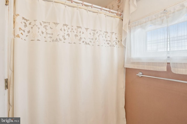 full bath with a shower with curtain