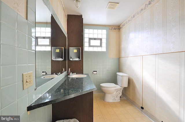 109 N Centre St, Philipsburg, PA 16866 - bathroom featuring a sink, visible vents, and a wealth of natural light