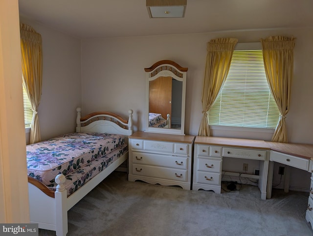 bedroom with light carpet