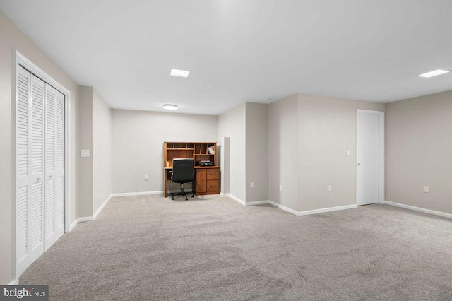 below grade area with carpet floors and baseboards