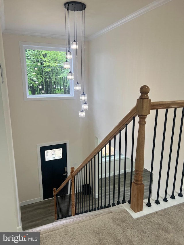 21 Piute Trl, Albrightsville, PA 18210 - staircase featuring crown molding, a chandelier, and baseboards