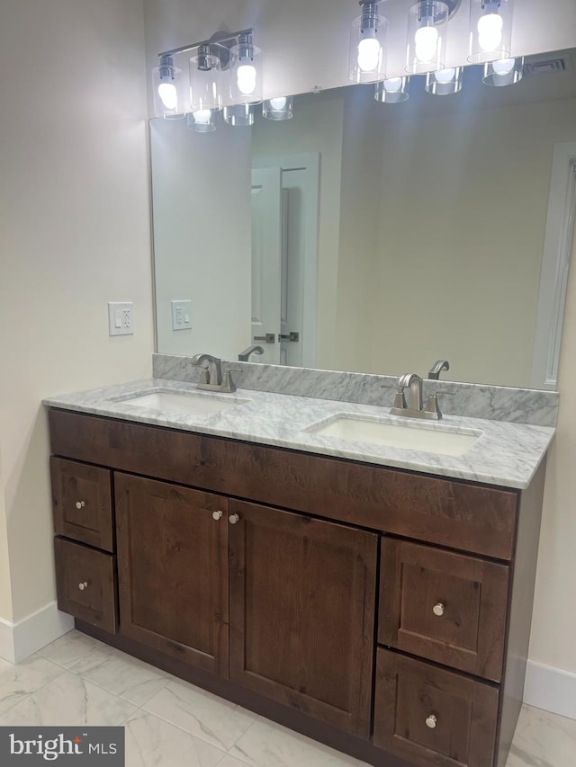 21 Piute Trl, Albrightsville, PA 18210 - bathroom featuring double vanity, marble finish flooring, and baseboards