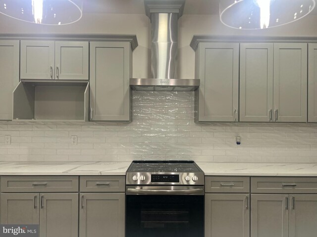 21 Piute Trl, Albrightsville, PA 18210 - kitchen with stainless steel range with electric cooktop, gray cabinetry, wall chimney range hood, backsplash, and light stone countertops