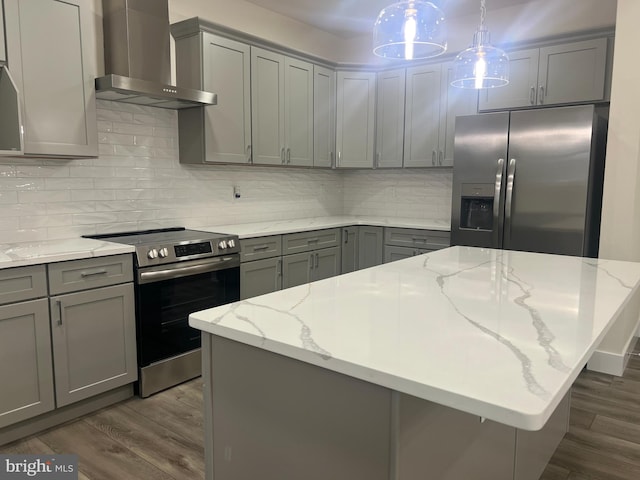 21 Piute Trl, Albrightsville, PA 18210 - kitchen with stainless steel appliances, wall chimney range hood, gray cabinets, and dark wood-style floors
