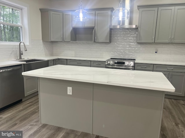 21 Piute Trl, Albrightsville, PA 18210 - kitchen with gray cabinets, appliances with stainless steel finishes, wall chimney exhaust hood, and a sink