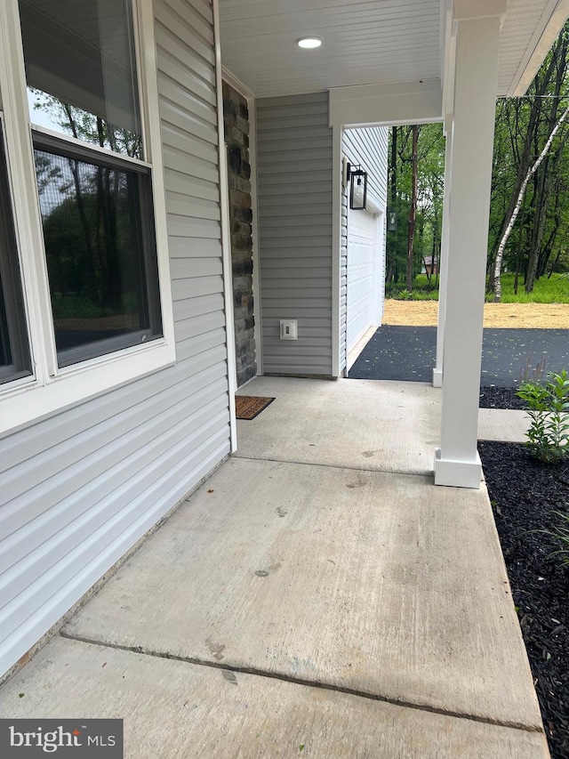 21 Piute Trl, Albrightsville, PA 18210 - view of patio / terrace featuring a garage