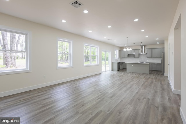 21 Piute Trl, Albrightsville, PA 18210 - unfurnished living room with recessed lighting, light wood finished floors, baseboards, and a chandelier