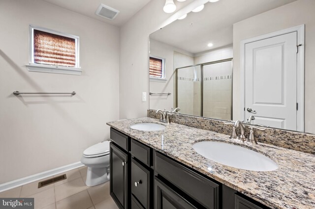 full bath featuring visible vents, baseboards, a sink, and a stall shower