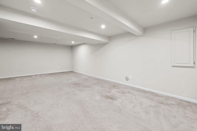 finished below grade area featuring carpet floors, baseboards, and recessed lighting