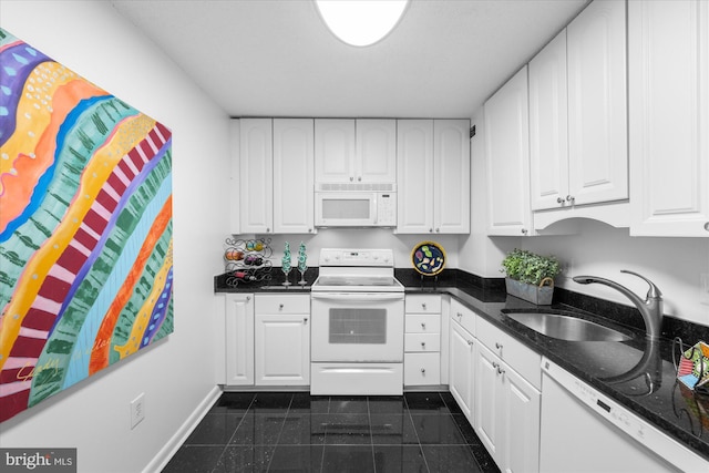 200 N Pickett St N Unit 1513, Alexandria, VA 22304 - kitchen featuring baseboards, white cabinetry, a sink, and white appliances