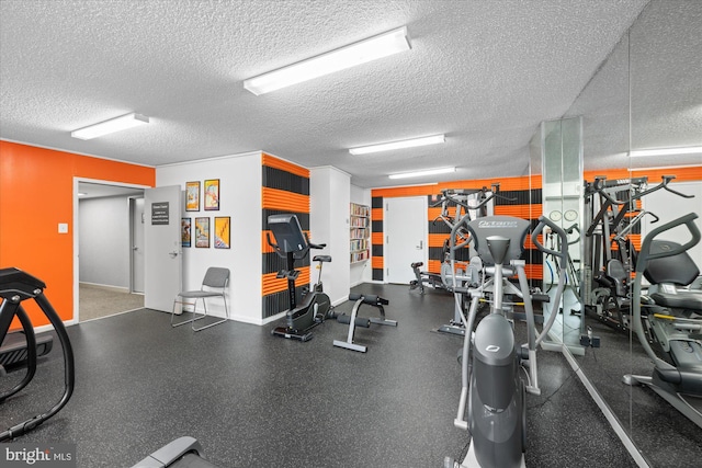 200 N Pickett St N Unit 1513, Alexandria, VA 22304 - exercise room with baseboards and a textured ceiling