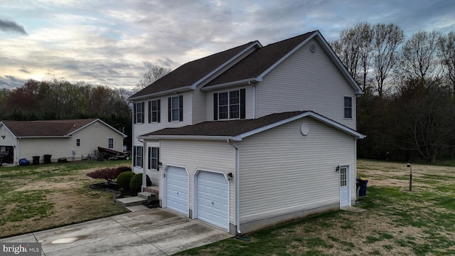174 W Chestnut Ridge Dr, Magnolia, DE 19962 - view of home's exterior featuring driveway, an attached garage, a yard, and roof with shingles
