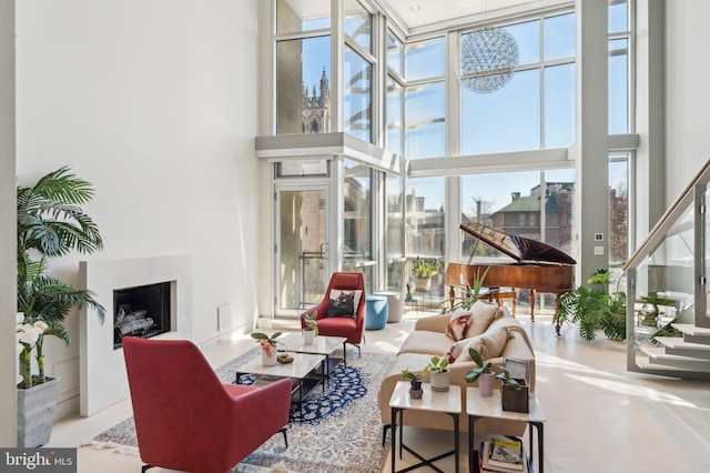 1612 16th St NW Unit 3, Washington, DC 20009 - living area with a high ceiling, healthy amount of natural light, and a fireplace