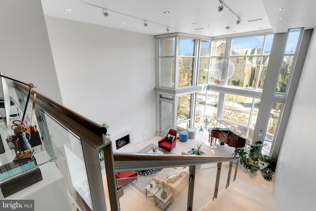 1612 16th St NW Unit 3, Washington, DC 20009 - staircase with track lighting and floor to ceiling windows