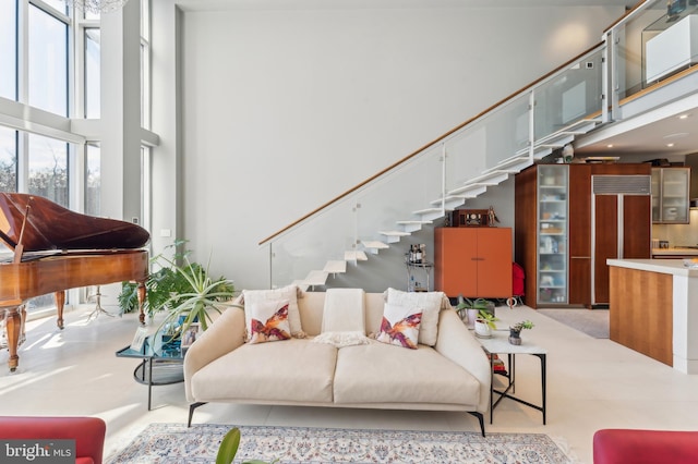 1612 16th St NW Unit 3, Washington, DC 20009 - living area featuring stairs and a towering ceiling