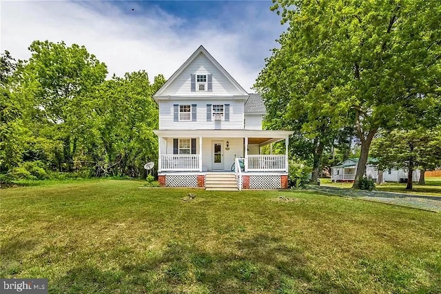 24171 Adelaide St, Parksley, VA 23421 - view of front of house featuring a front lawn and covered porch