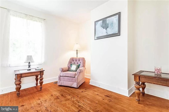 24171 Adelaide St, Parksley, VA 23421 - sitting room with baseboards and hardwood / wood-style floors