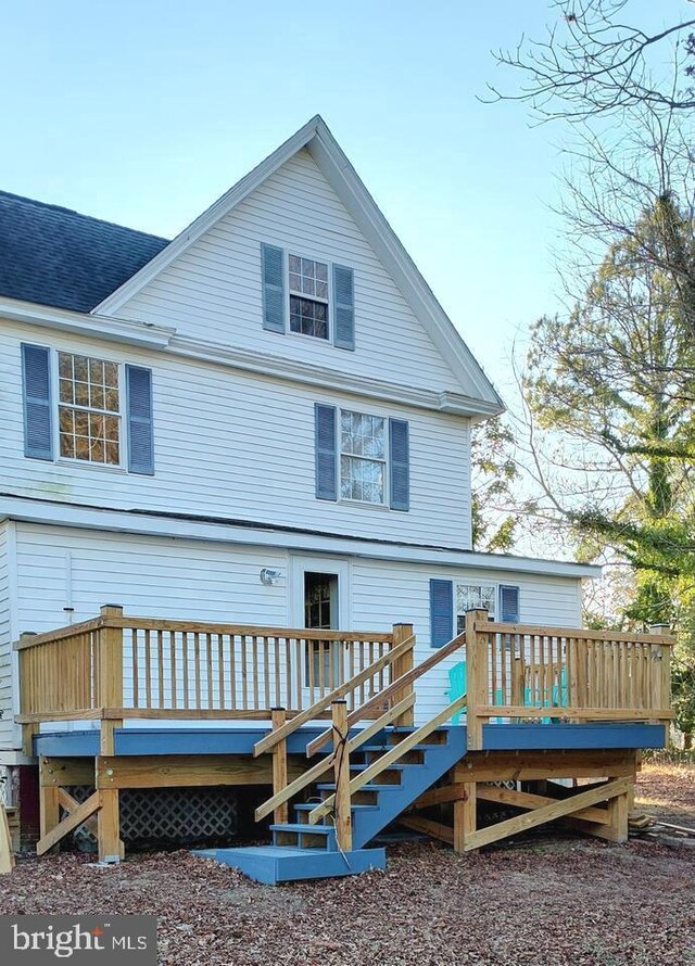24171 Adelaide St, Parksley, VA 23421 - rear view of property featuring stairway and a deck