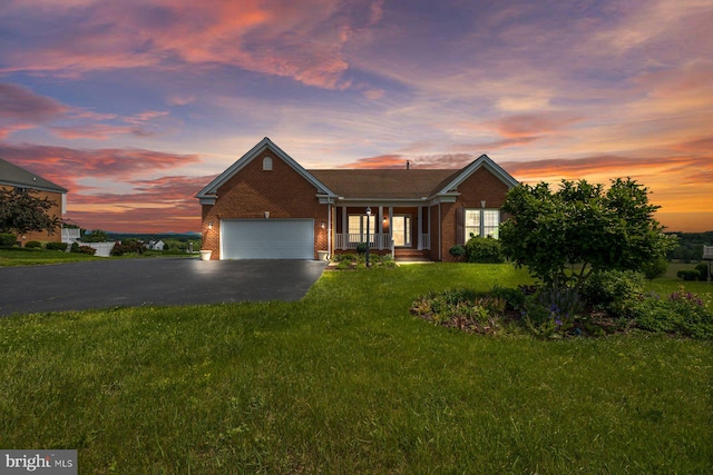 15920 Broadfording Rd, Hagerstown, MD 21740 - ranch-style home featuring brick siding, an attached garage, driveway, a lawn, and a porch