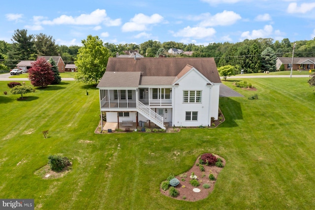 15920 Broadfording Rd, Hagerstown, MD 21740 - rear view of property featuring a sunroom, stairway, and a yard