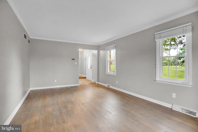 3228 Canterbury Ln, Fallston, MD 21047 - empty room featuring ornamental molding, baseboards, and wood finished floors