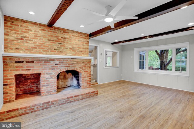 3228 Canterbury Ln, Fallston, MD 21047 - unfurnished living room with wood finished floors, beam ceiling, ceiling fan, a fireplace, and recessed lighting
