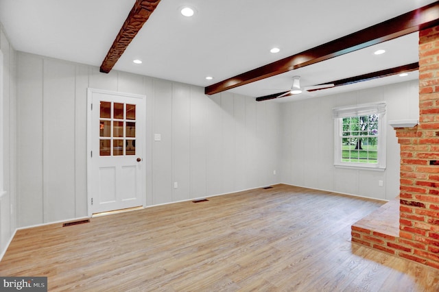 3228 Canterbury Ln, Fallston, MD 21047 - unfurnished living room featuring wood finished floors, beam ceiling, recessed lighting, a decorative wall, and ceiling fan