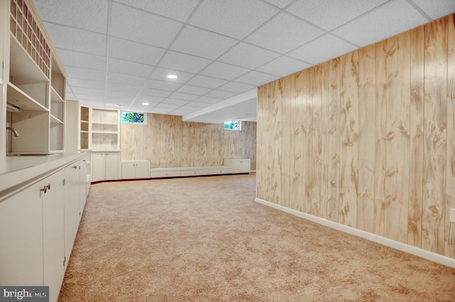 3228 Canterbury Ln, Fallston, MD 21047 - basement with a sink, wooden walls, carpet flooring, a paneled ceiling, and baseboards