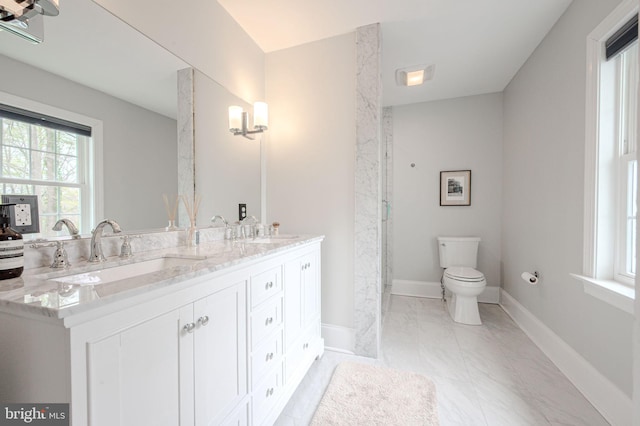 312 Center Hill Rd, Wilmington, DE 19807 - full bath with baseboards, marble finish floor, a sink, and toilet