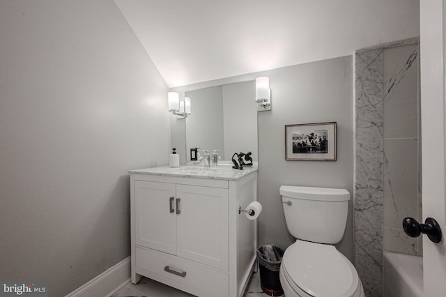 312 Center Hill Rd, Wilmington, DE 19807 - bathroom featuring a bathing tub, toilet, vanity, marble finish floor, and lofted ceiling