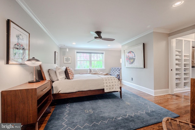 312 Center Hill Rd, Wilmington, DE 19807 - bedroom with ceiling fan, baseboards, ornamental molding, and wood finished floors