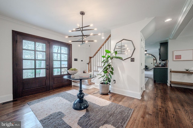 312 Center Hill Rd, Wilmington, DE 19807 - foyer entrance featuring french doors, ornamental molding, and wood finished floors