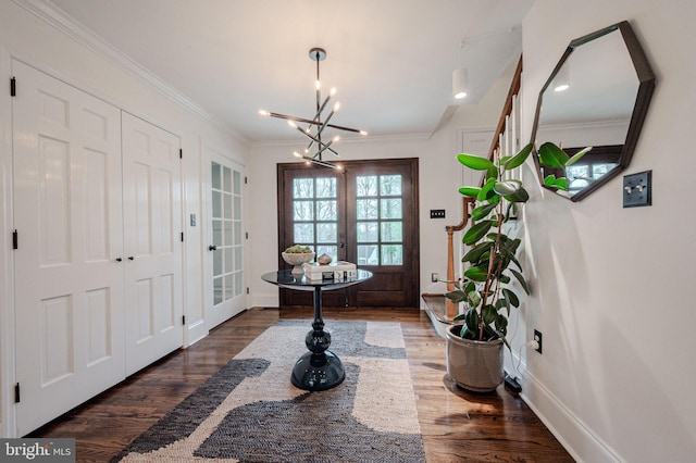 312 Center Hill Rd, Wilmington, DE 19807 - entrance foyer with baseboards, ornamental molding, a chandelier, french doors, and wood finished floors