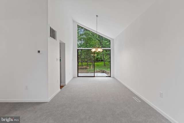 5338 Lightning View Rd, Columbia, MD 21045 - unfurnished room featuring high vaulted ceiling, carpet flooring, a chandelier, and baseboards