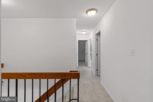 5338 Lightning View Rd, Columbia, MD 21045 - corridor featuring light colored carpet, an upstairs landing, and baseboards