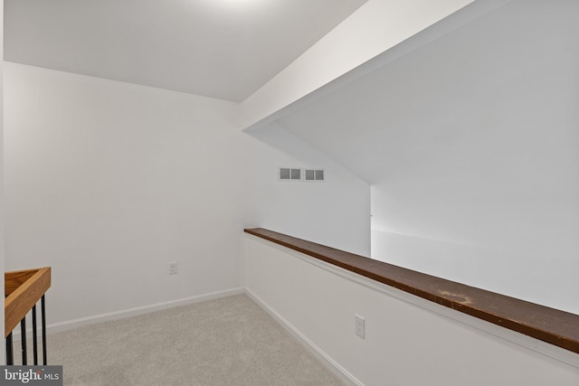 5338 Lightning View Rd, Columbia, MD 21045 - hallway with light colored carpet, lofted ceiling, and baseboards