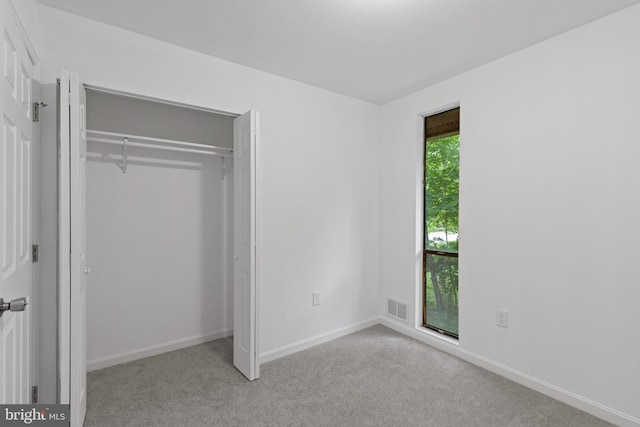 5338 Lightning View Rd, Columbia, MD 21045 - unfurnished bedroom with carpet flooring, baseboards, and a closet