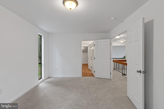5338 Lightning View Rd, Columbia, MD 21045 - unfurnished bedroom with light carpet and baseboards