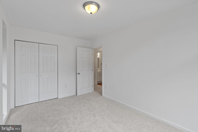 5338 Lightning View Rd, Columbia, MD 21045 - unfurnished bedroom with carpet, baseboards, and a closet