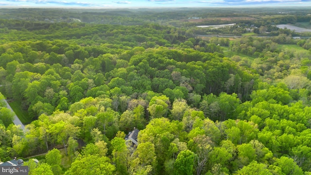 drone / aerial view with a forest view