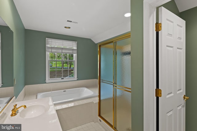 full bath featuring a bath, visible vents, a stall shower, a sink, and lofted ceiling