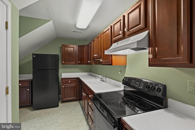 kitchen with lofted ceiling, light countertops, under cabinet range hood, a sink, and black appliances