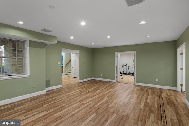 interior space with visible vents, baseboards, stairway, recessed lighting, and light wood-style flooring